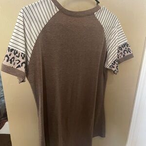 Women’s short sleeve t-shirt brown with animal print sleeves.  Size medium